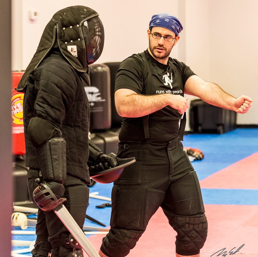 Highland Sword Fighting Guild class in Aurora Ontario practicing Historical European Martial Arts (HEMA) with broadswords